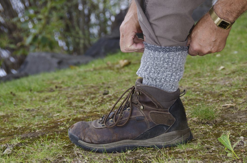 Protecting Against Ticks by Tucking Pants into Socks Sussex Travel Clinic